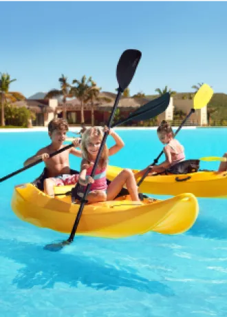Kids Kayaking Evermore Bay Kids enjoying Kayaking in Evermore Bay
