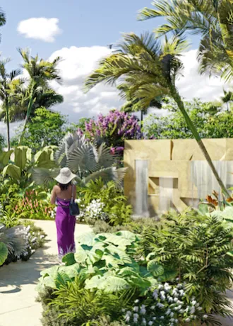 Conrad Spa Rendering Exterior image of woman walking through spa water garden at the entrance of Conrad Spa