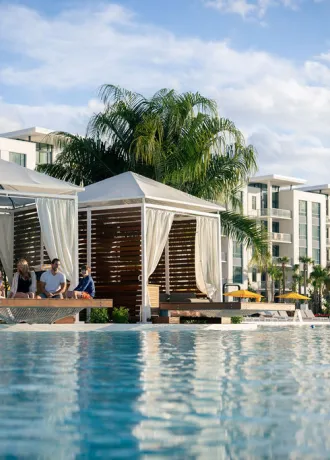 Family sitting in a cabana