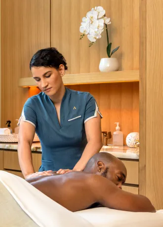 Conrad Spa Orlando Massage 1 An image of a massage treatment experience at Conrad Spa Orlando at Evermore Orlando Resort.