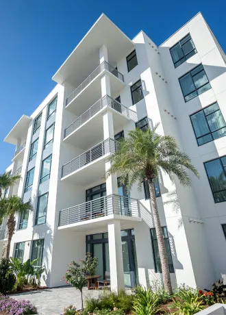 5-Story Tower Flats Image of the exterior of the 5-Story Tower Flats at Evermore Orlando Resort.