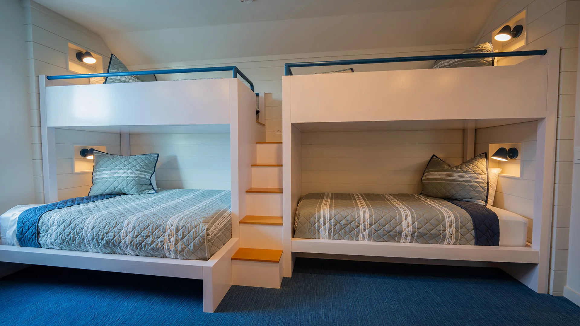 An image of a bunkroom showing 4 beds in an 11 bedroom house at Evermore. 