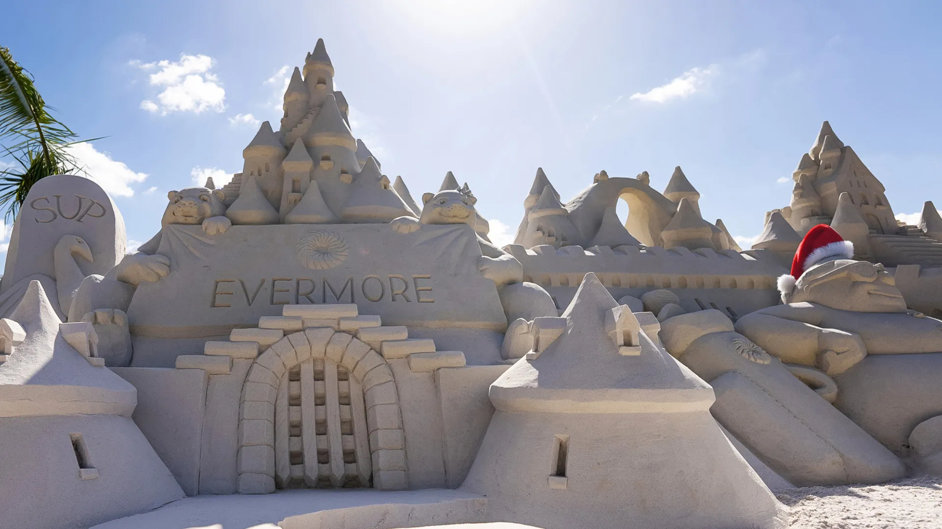Evermore Artisanal Sandcastle During the Holidays An image of a detailed artisanal sandcastle during the holidays at Evermore Orlando Resort.