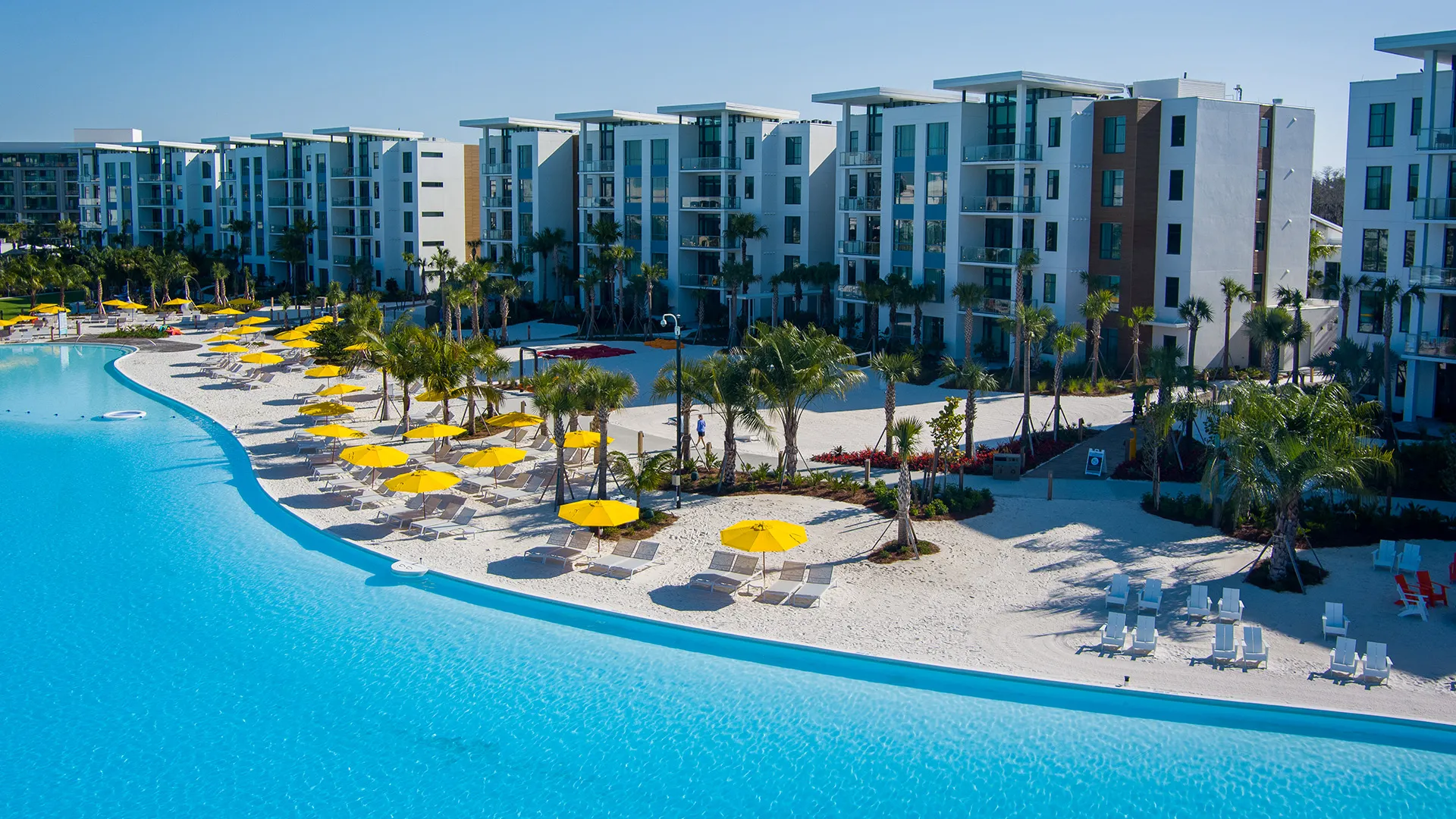 Aerial image of the 5-Story Tower Flats with a view of Evermore Bay.