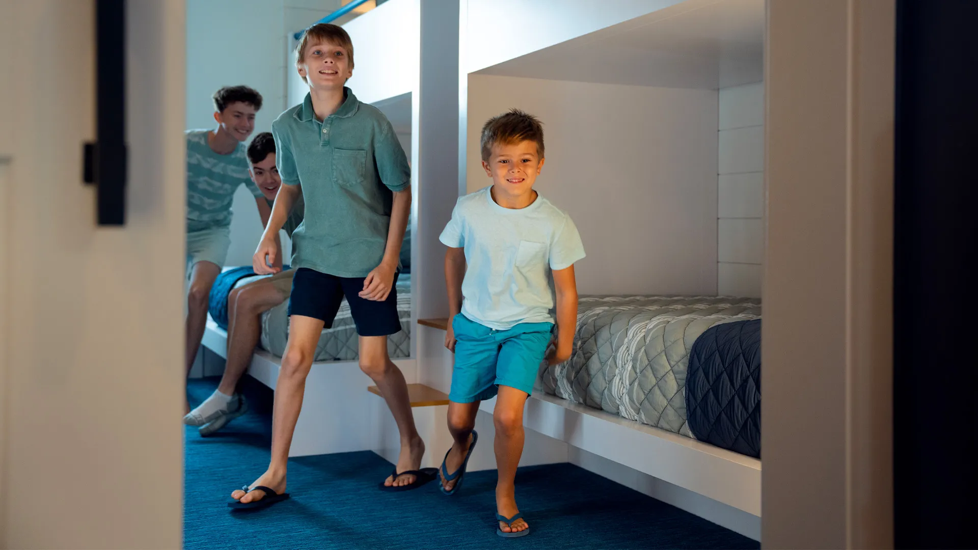 An image of kids in a bunkroom in a large evermore house.