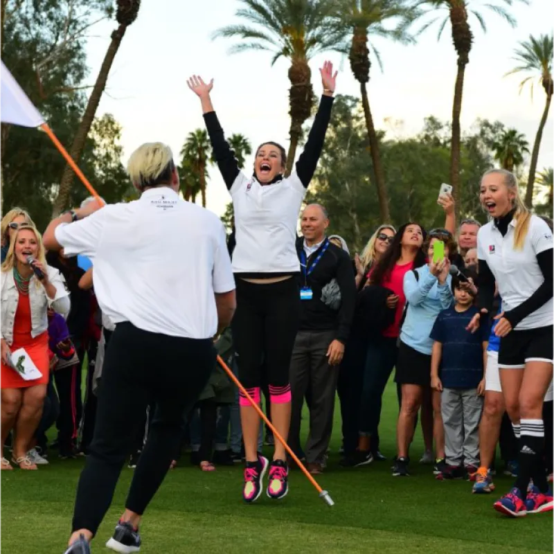 Foot Golfers Celebrating Win Foot Golfers celebrating win on course hole