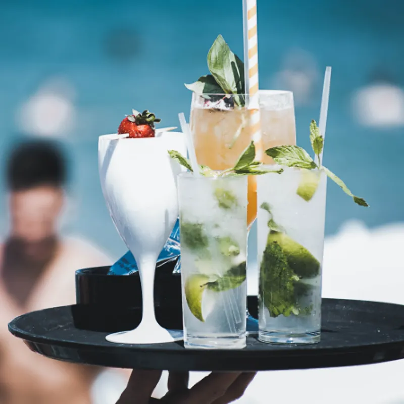 Poolside Beverages on Tray Poolside Beverages being carried on Drink Tray by staff