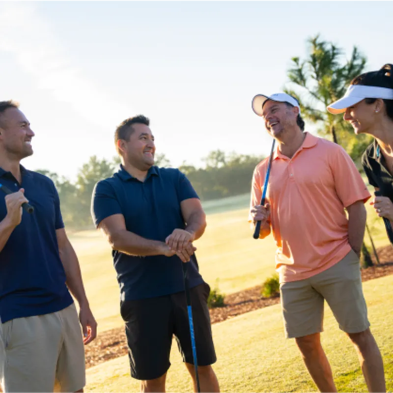 Group of golfers smiling 
