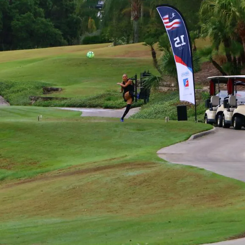 Foot Golf Kicker Action Shot on Course Foot Golf kicker mid-kick on course