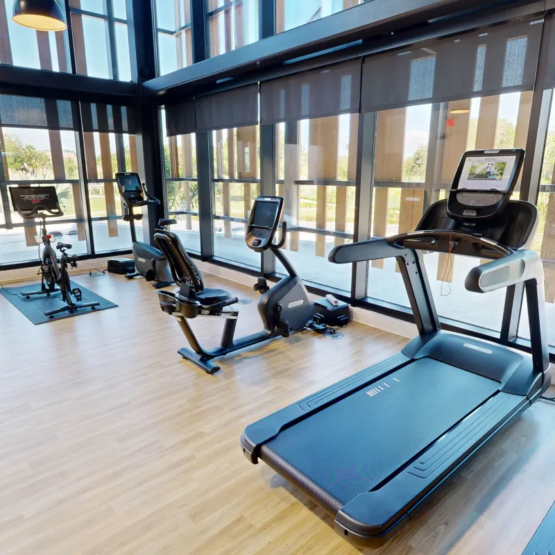 An an image of the workout equipment available to use in the Fitness Center within The Landing at Evermore Orlando Resort.