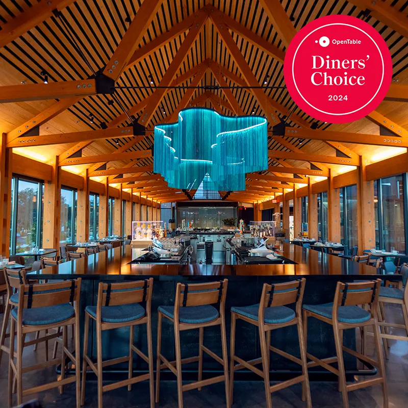 An image of the interior of Twin View Restaurant and Bar at Evermore Orlando Resort. Winner of an OpenTable Diners' Choice Award for 2024.