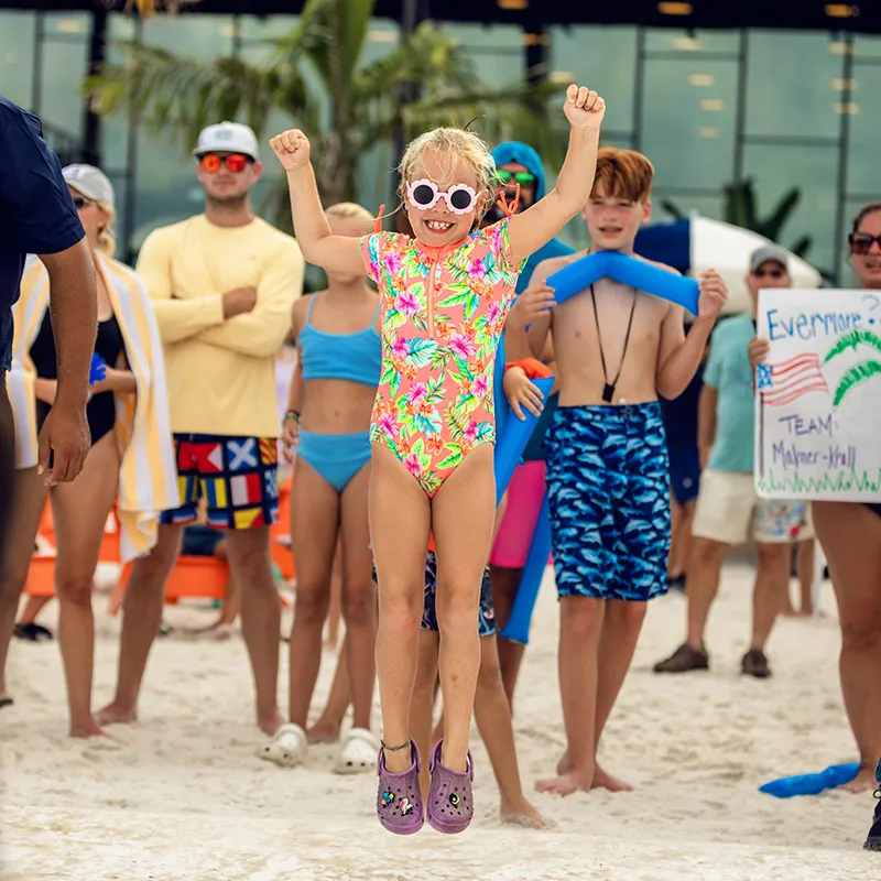 An image of guests having fun while participating in Evermore Bay Games at Evermore Orlando Resort.