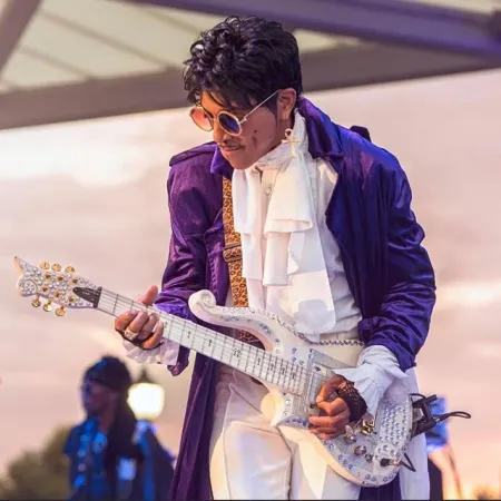 An image of Purple Madness, who will be performing in the Evermore Concert Series at Evermore Orlando Resort.