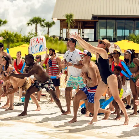 Bay Games Competition Image of guests participation in a fun competition during Evermore Bay Games at Evermore Orlando Resort.