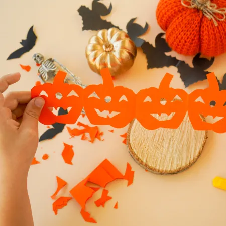Image of Halloween-themed crafts being created during a Halloween activity.