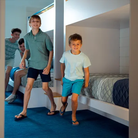 An image of kids in a bunkroom in an evermore house.