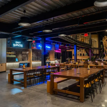 Image of the interior of the Food Hall inside The Landing at Evermore Orlando Resort.
