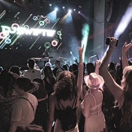 Image of DJ Swiftie, who will be performing in the Evermore Concert Series at Evermore Orlando Resort.